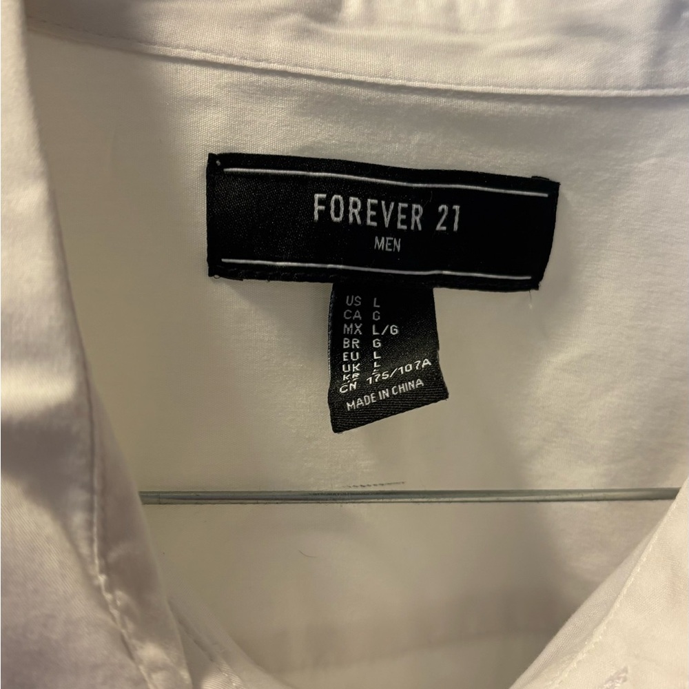 Men’s white button down shirt.